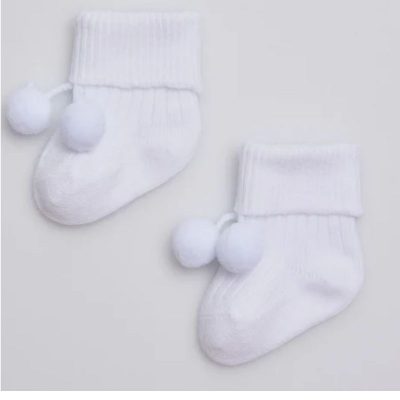 Calcetines de bebé en canalé blanco con borlas decorativas
